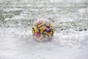 Winter Football Training in snow